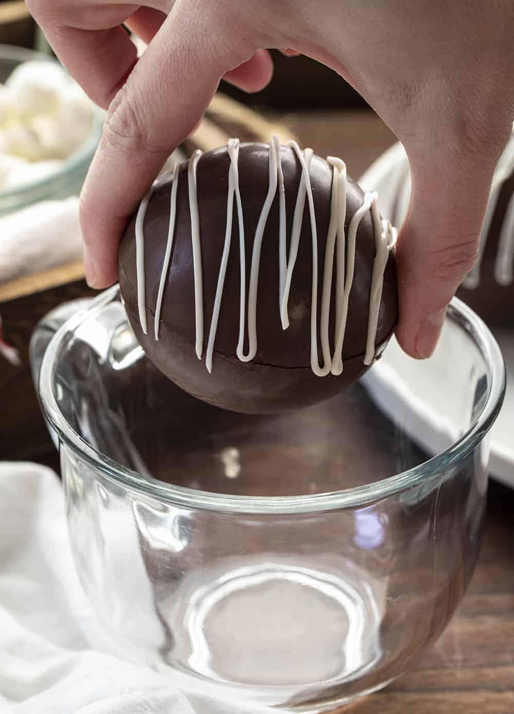 Adding Hot Chocolate Bomb to a Mug