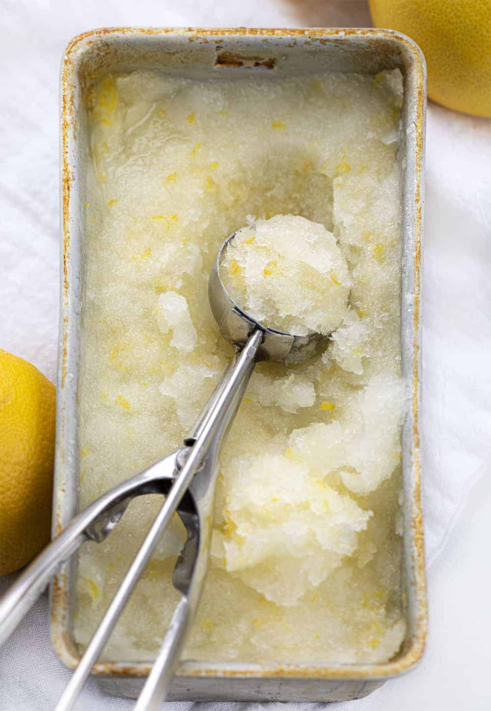 Scooping out Lemon Sorbet Recipe (No Churn) 