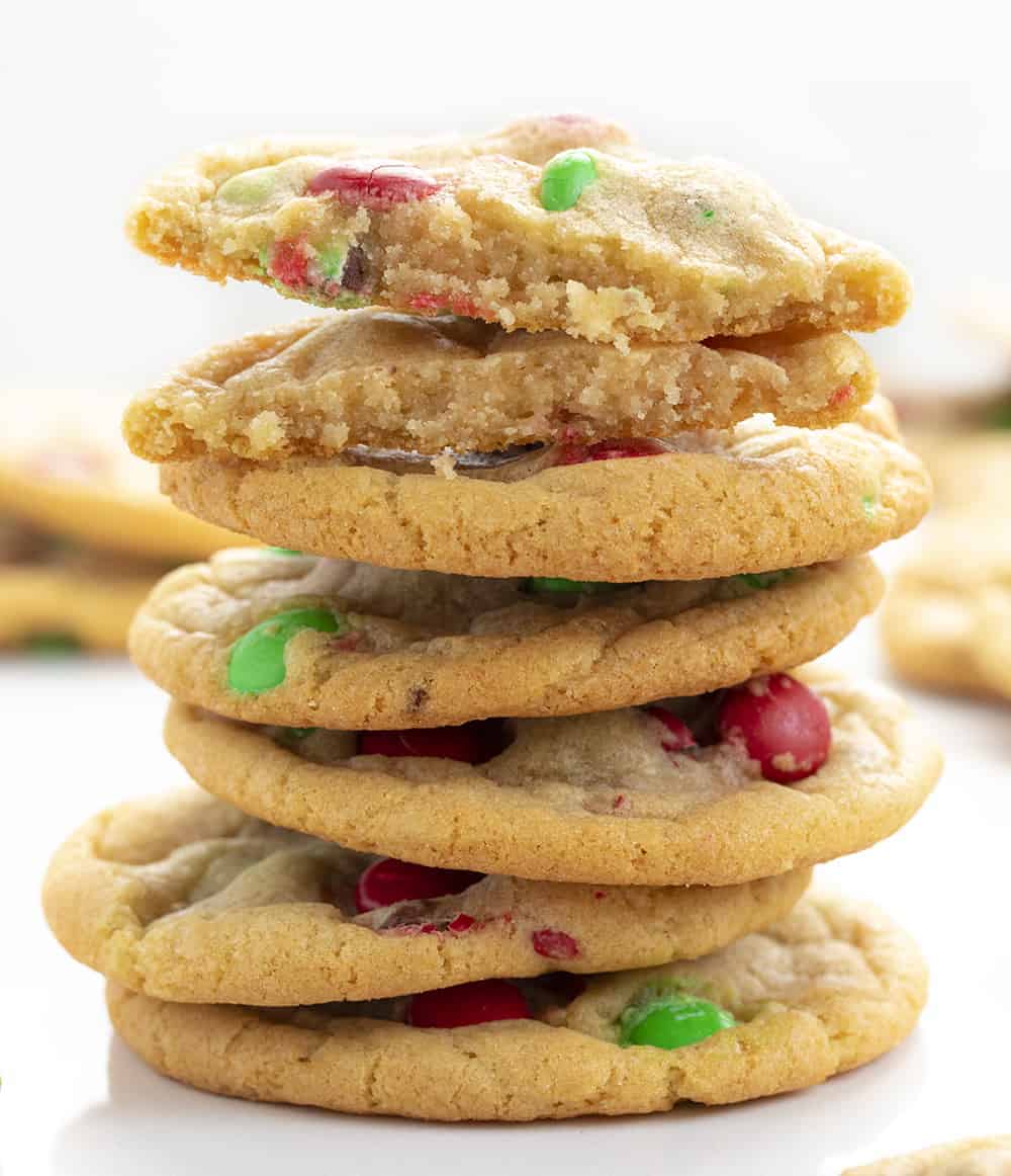 Stack of Christmas M&M Cookies With One Broken Showing Inside