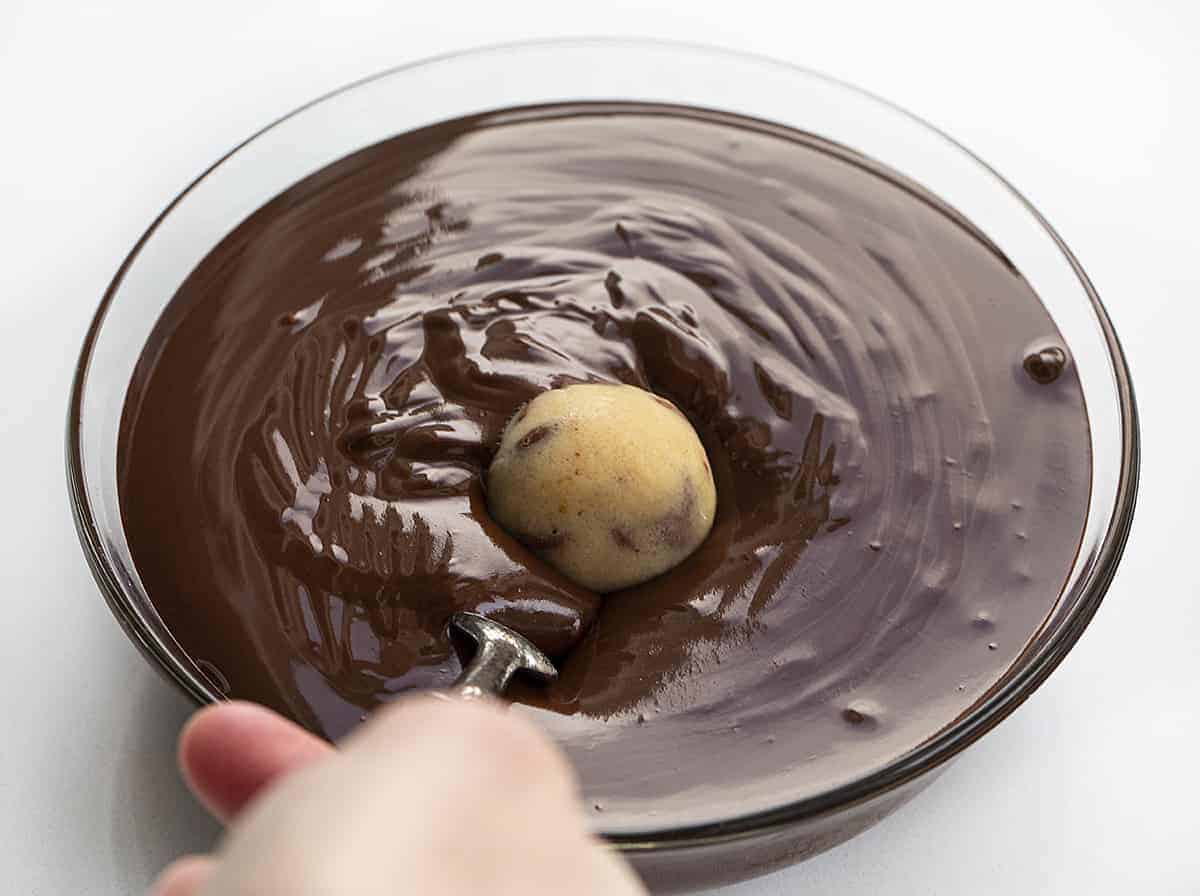 Dipping Cookie Dough into Chocolate