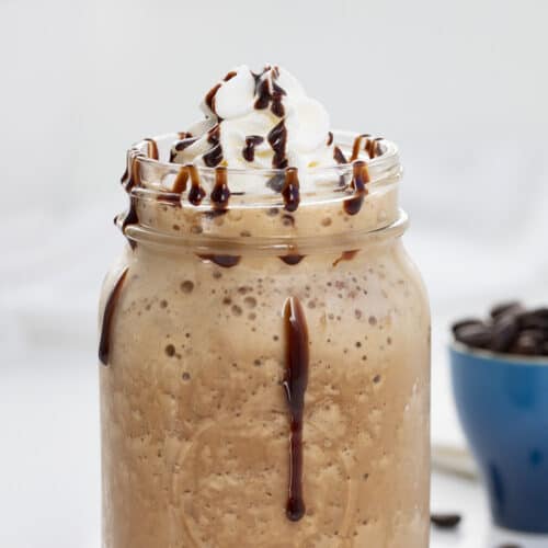 pour the frappe from the shaker into a tall glass , beautiful and