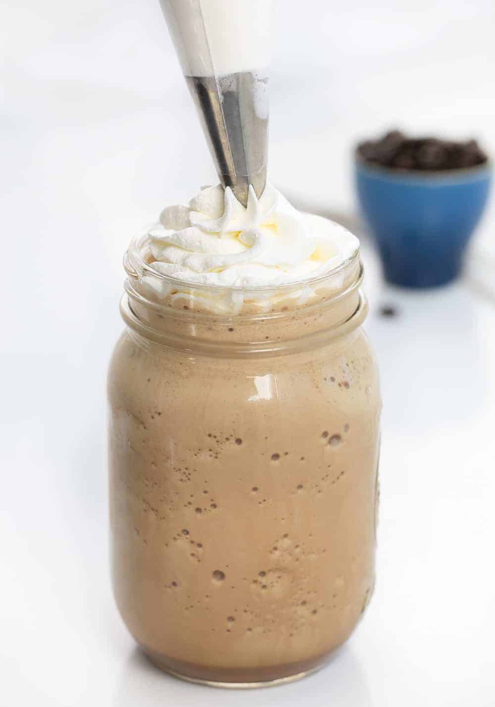 Piping Frosting on Copycat Mocha Frappuccino 
