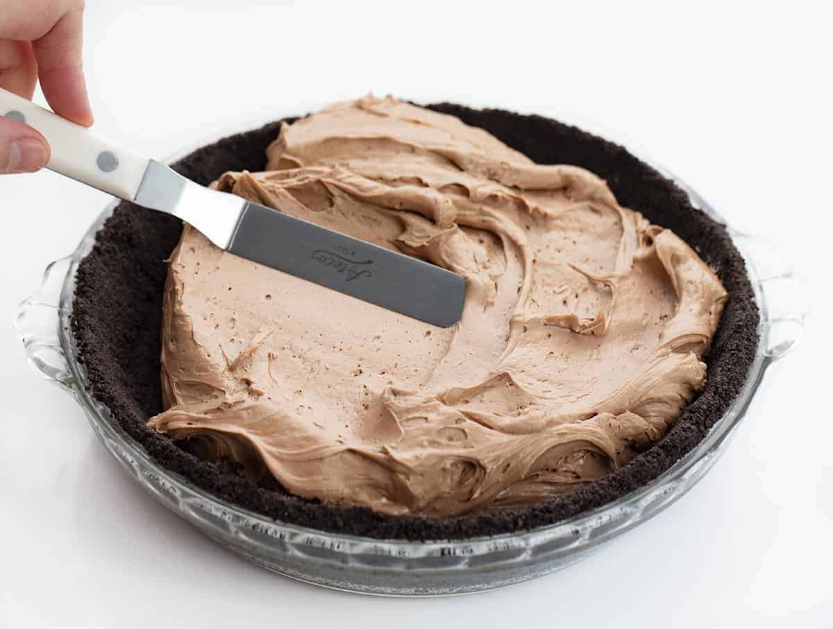 Spreading Cream Filling in Bailey's Chocolate Cream Pie 