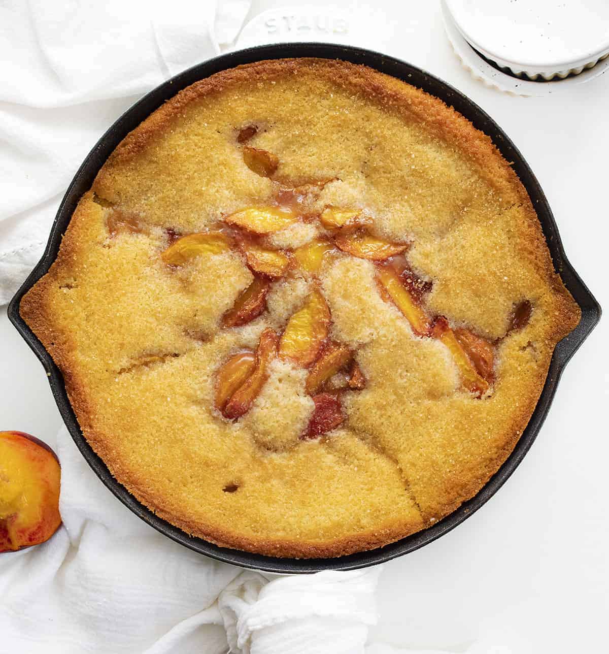 Cast iron skillet peach cobbler. In 12 inch cast iron skillet melt