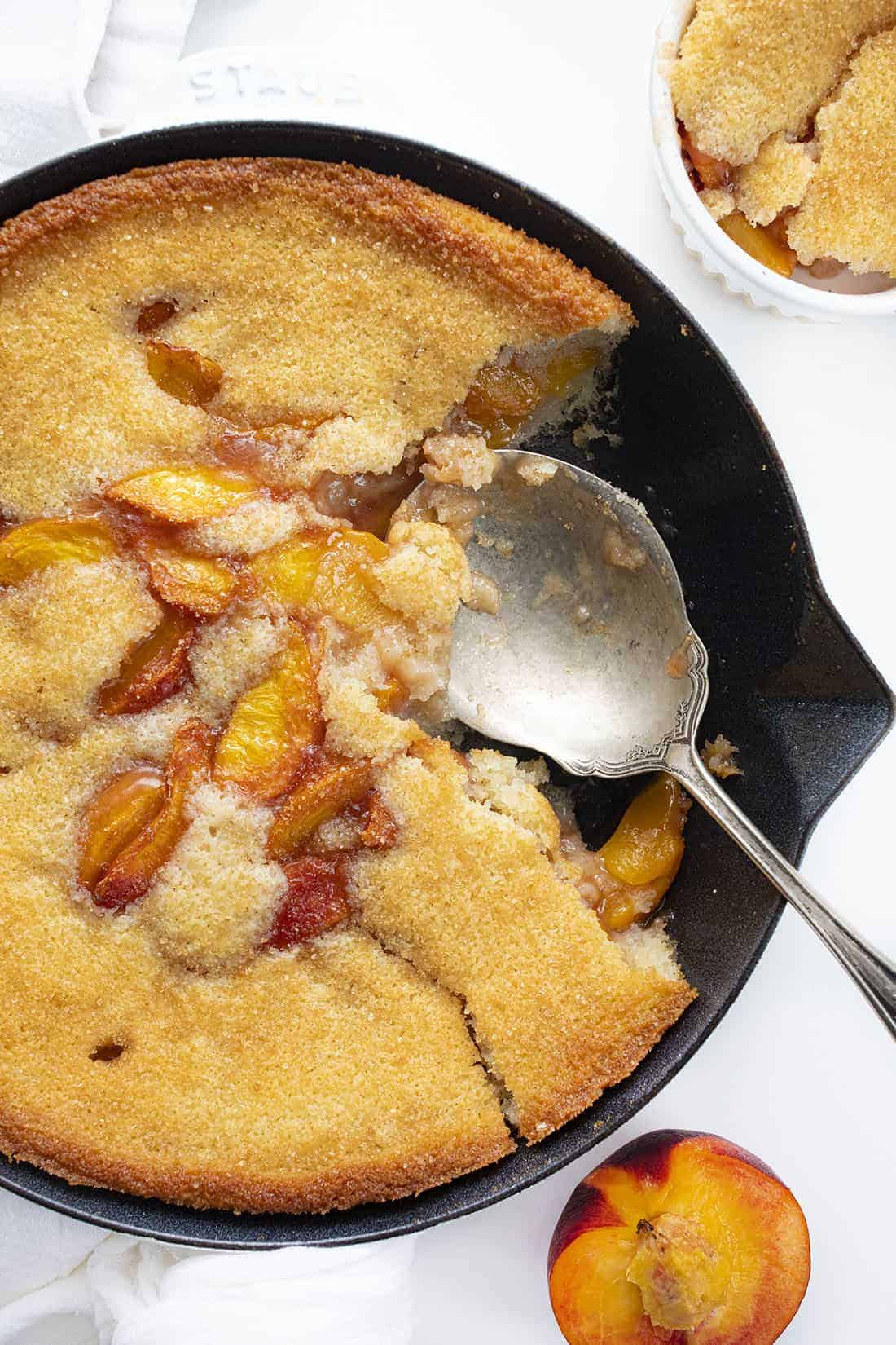 Spoon in Peach Skillet Cake