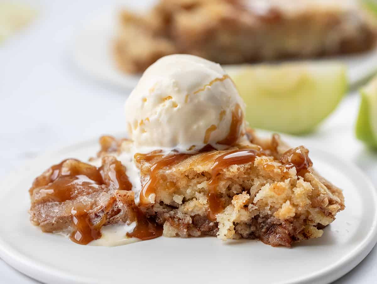 Piece of Swedish Apple Pie on a White Plate Showing Texture.