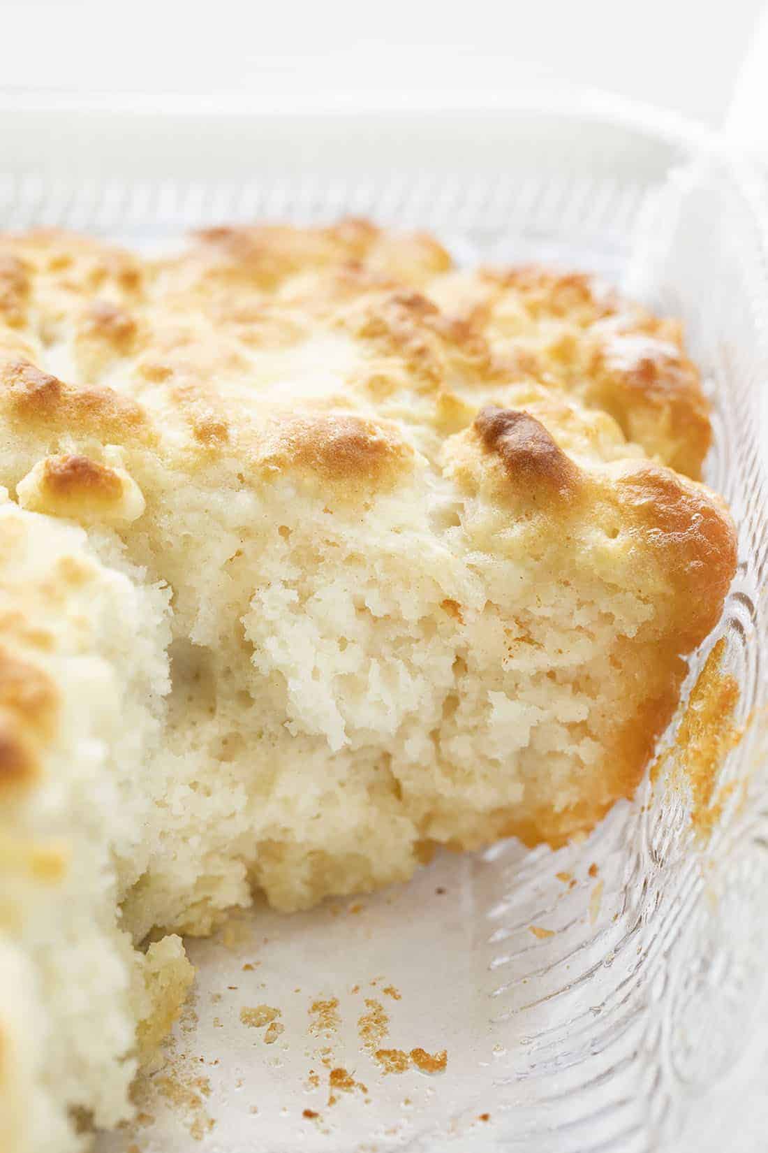 Butter Swim Biscuits in Pan with One Removed