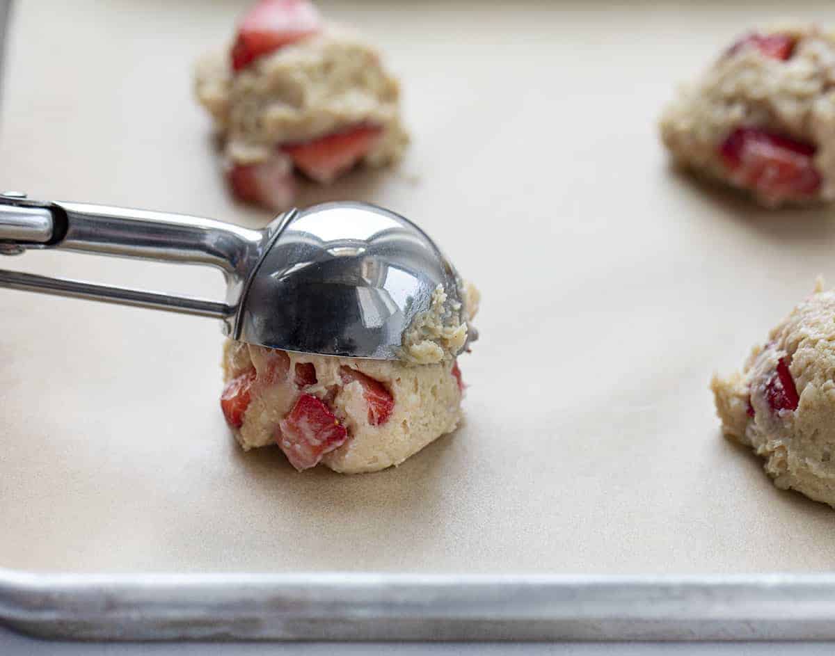 Soft Batch Strawberry Cookies Being SCooped onto Cookie Sheet