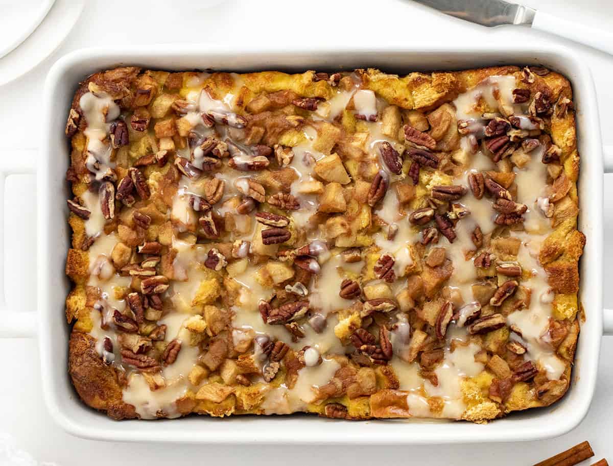 Overhead of Overnight Apple French Toast Bake in a White Casserole Pan