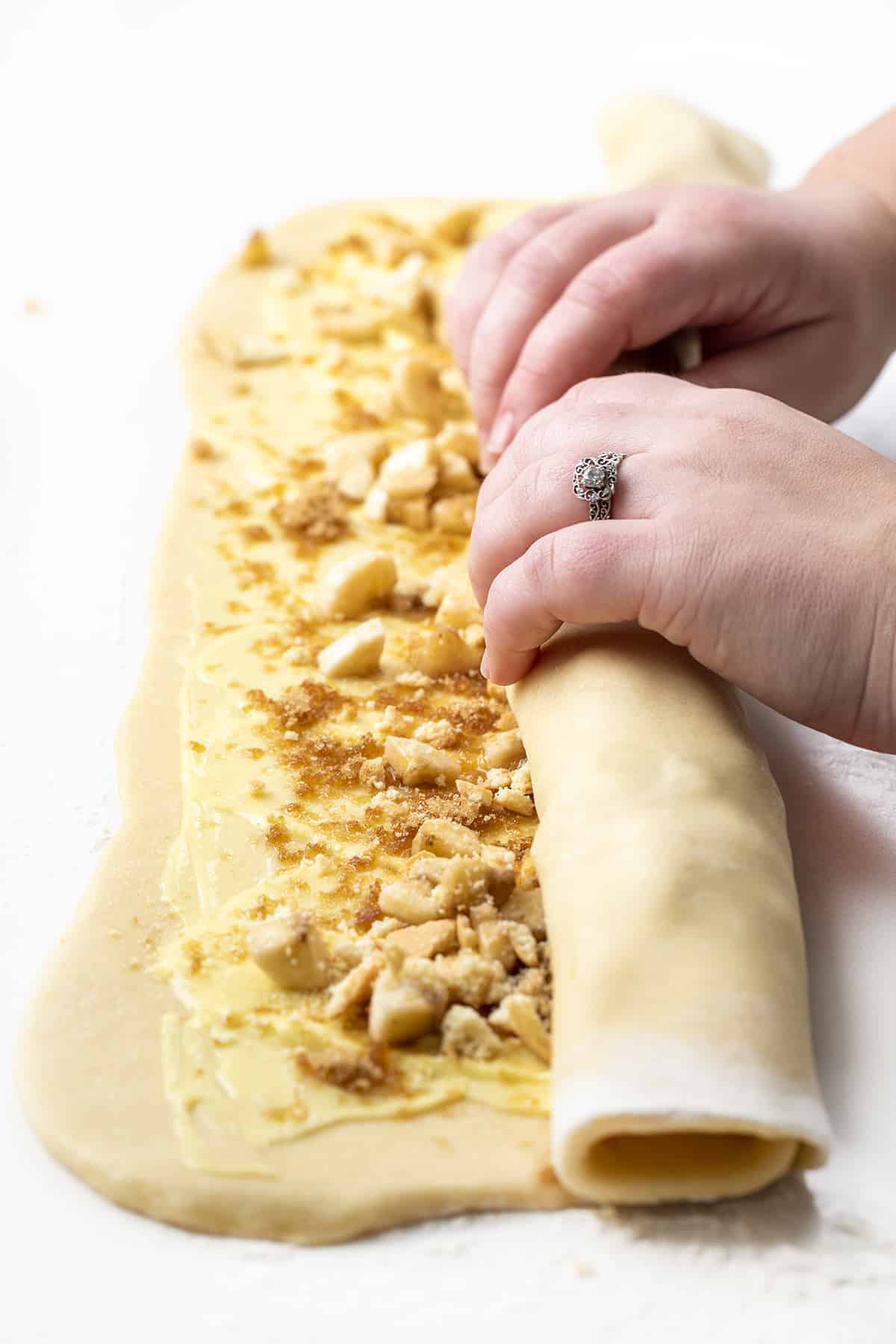 Rolling up dough for Banana Sweet Rolls