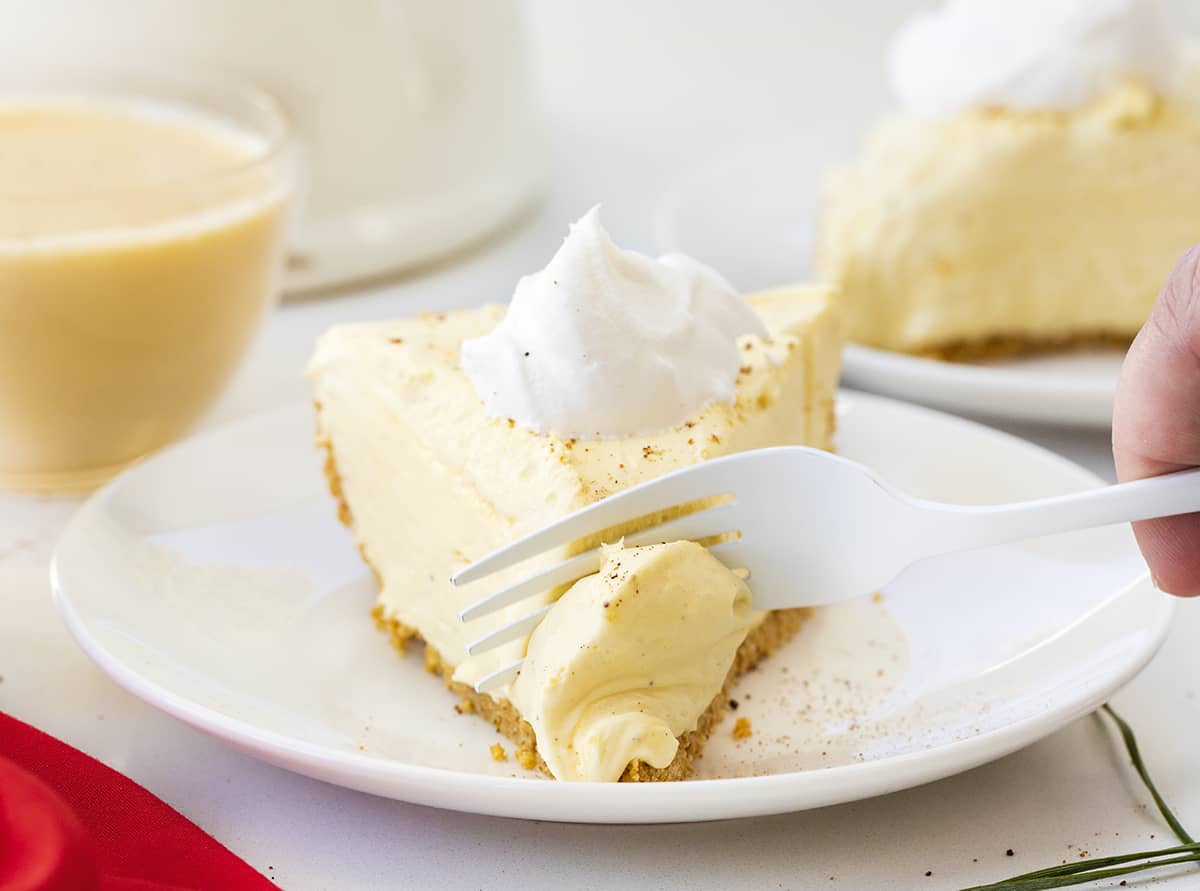 Slice of Eggnog Pie with Fork Removing a Bite