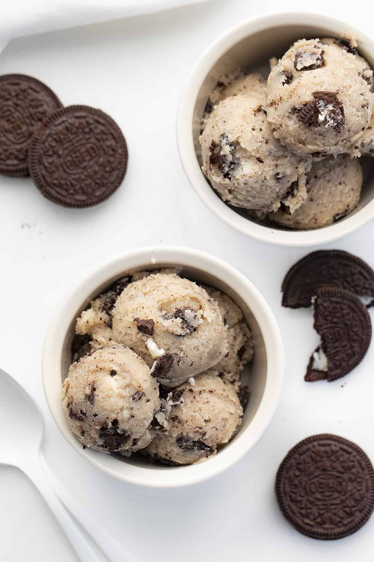 Bowls of Oreo Cookie Dough with Oreos and Spoons