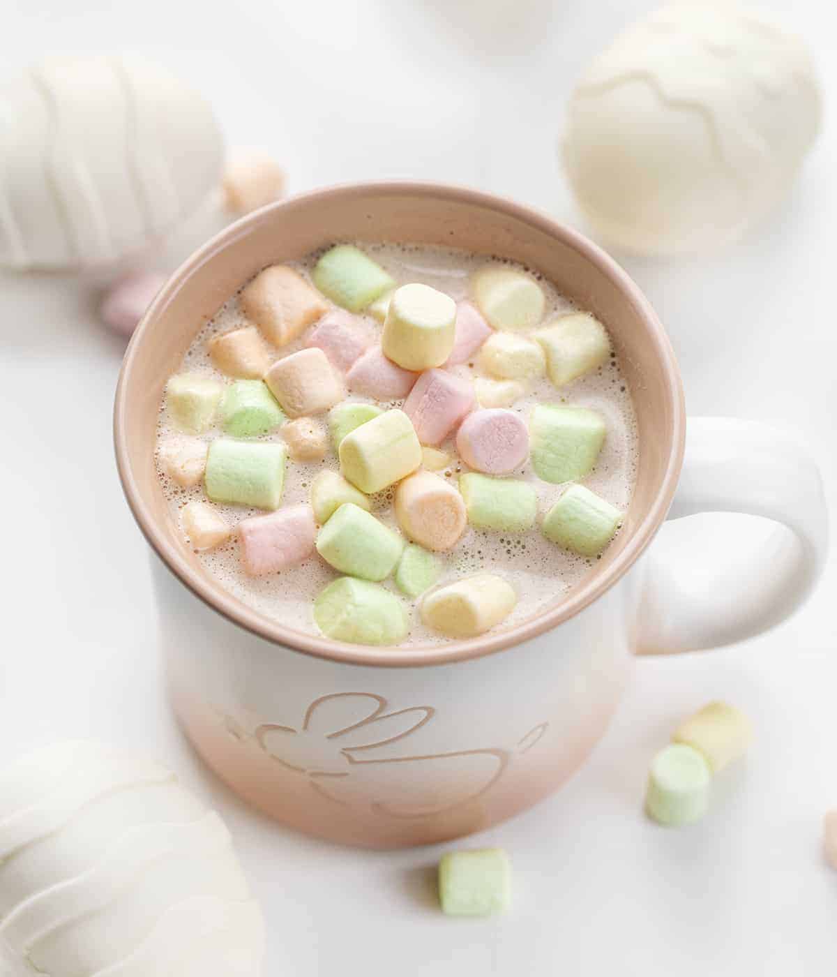 Mug Filled with White Chocolate Cocoa from a Easter Hot Cocoa Bomb