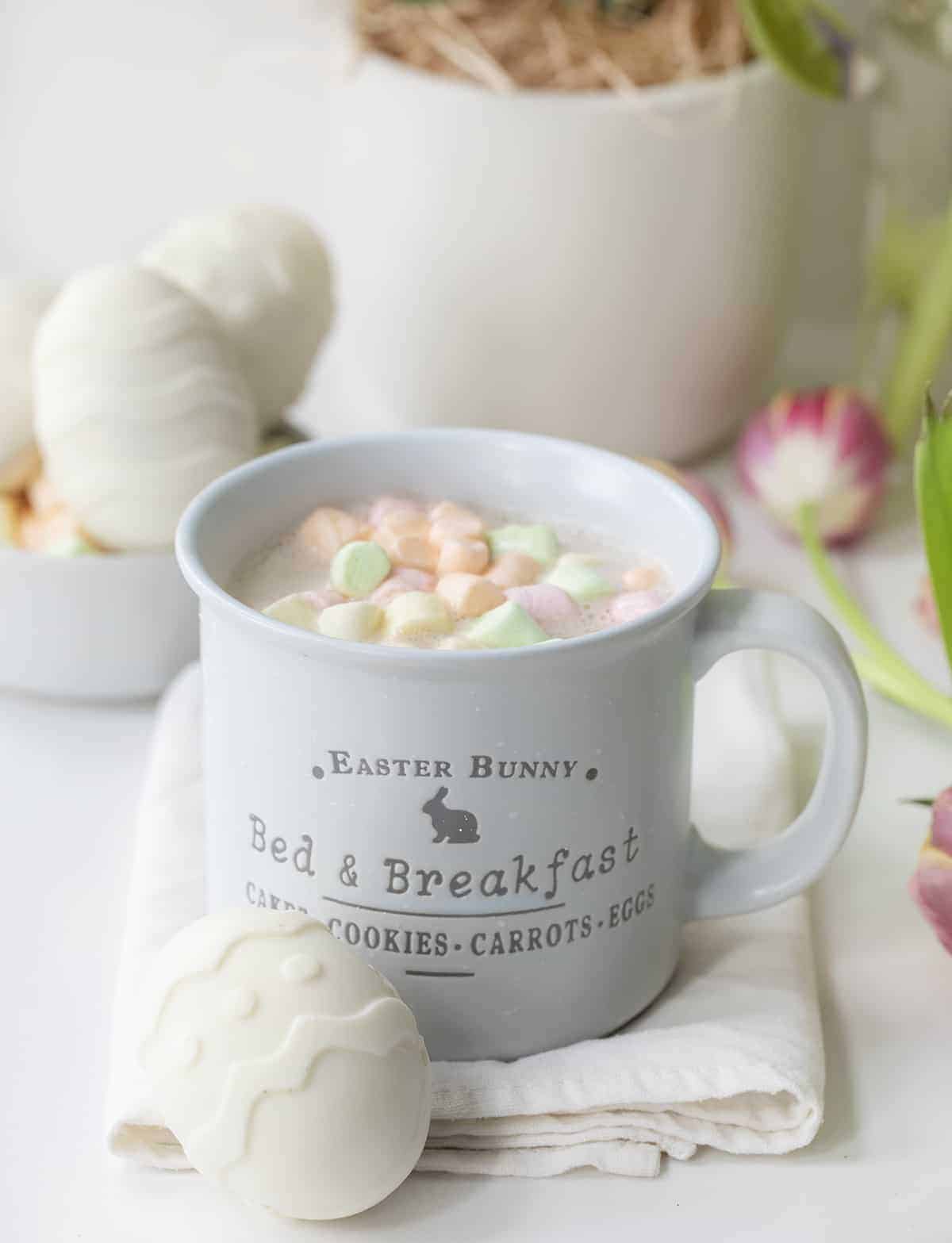 Cup Filled with Malted White Chocolate Cocoa from an Easter Egg Cocoa Bomb