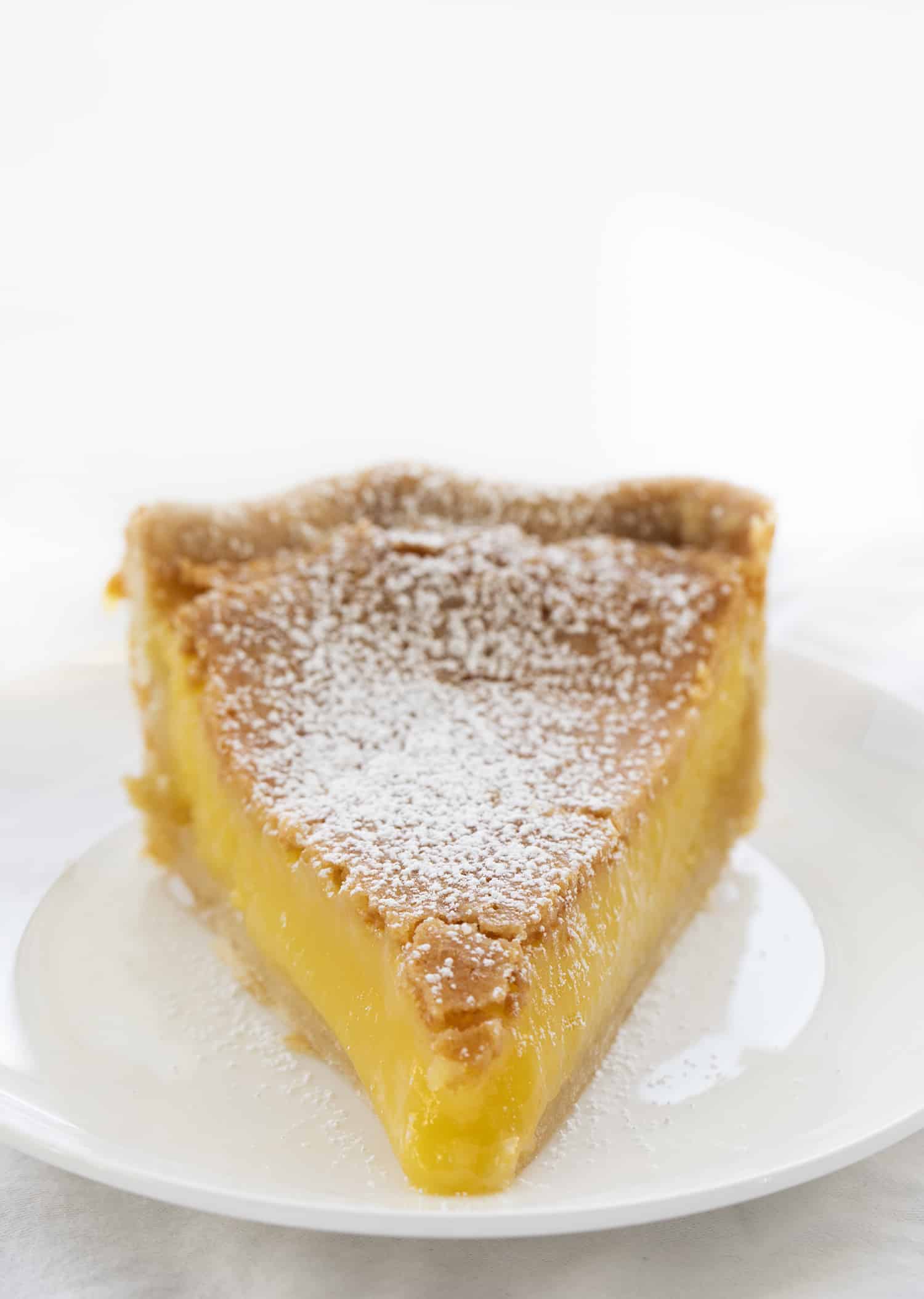 Piece of Chess Pie on a White Plate