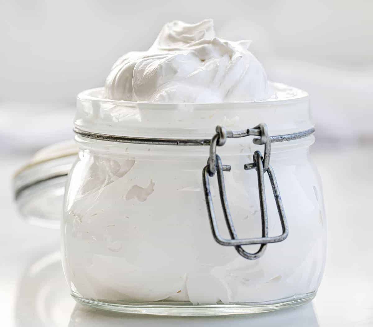 Jar of Homemade Marshmallow Fluff on White Counter