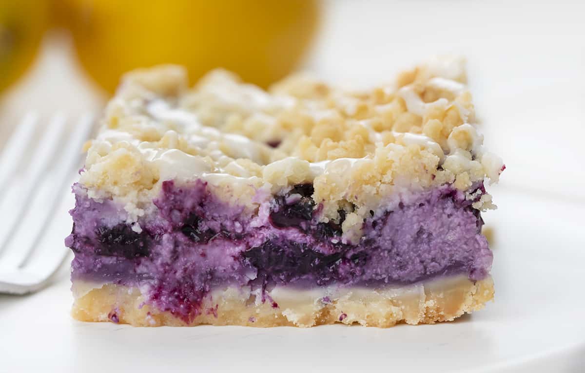 Very Close up of Blueberry Pie Bars on a Plate. Dessert, Bars, Blueberry Pie Bars, Lemon Blueberry Pie Bars, Summer Desserts, Bar Recipes, Crumble Bars, Blueberry Desserts, Baking, Summer Baking, i am baker, iambaker