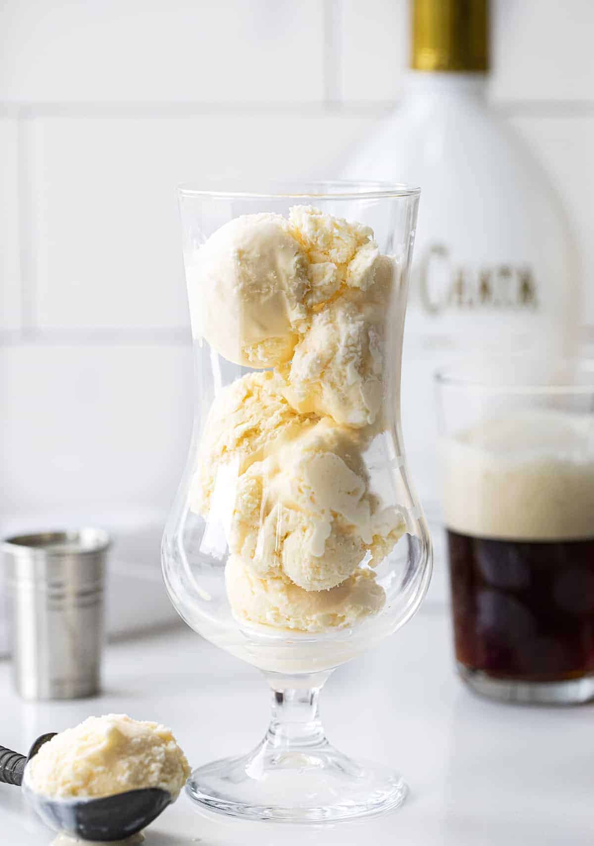 Glass Filled with Ice Cream to Make a Dirty Root Beer Float - RumChata Root Beer Float.