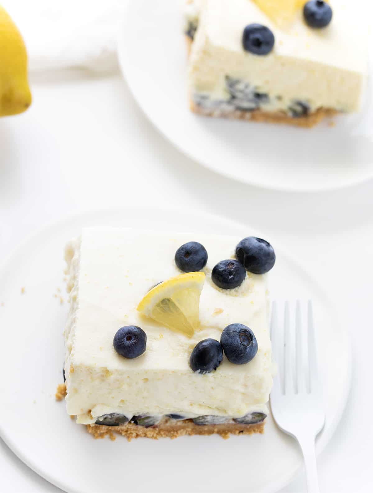 Plate with Two Pieces of Blueberry Icebox Cake on a White Plate.