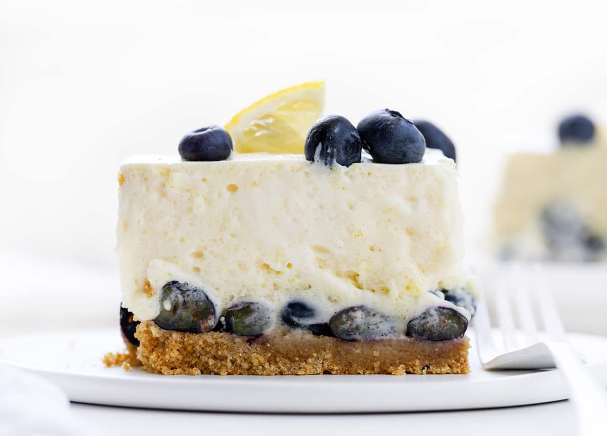 Plate with One Piece of  Blueberry Icebox Cake on a White Plate. 