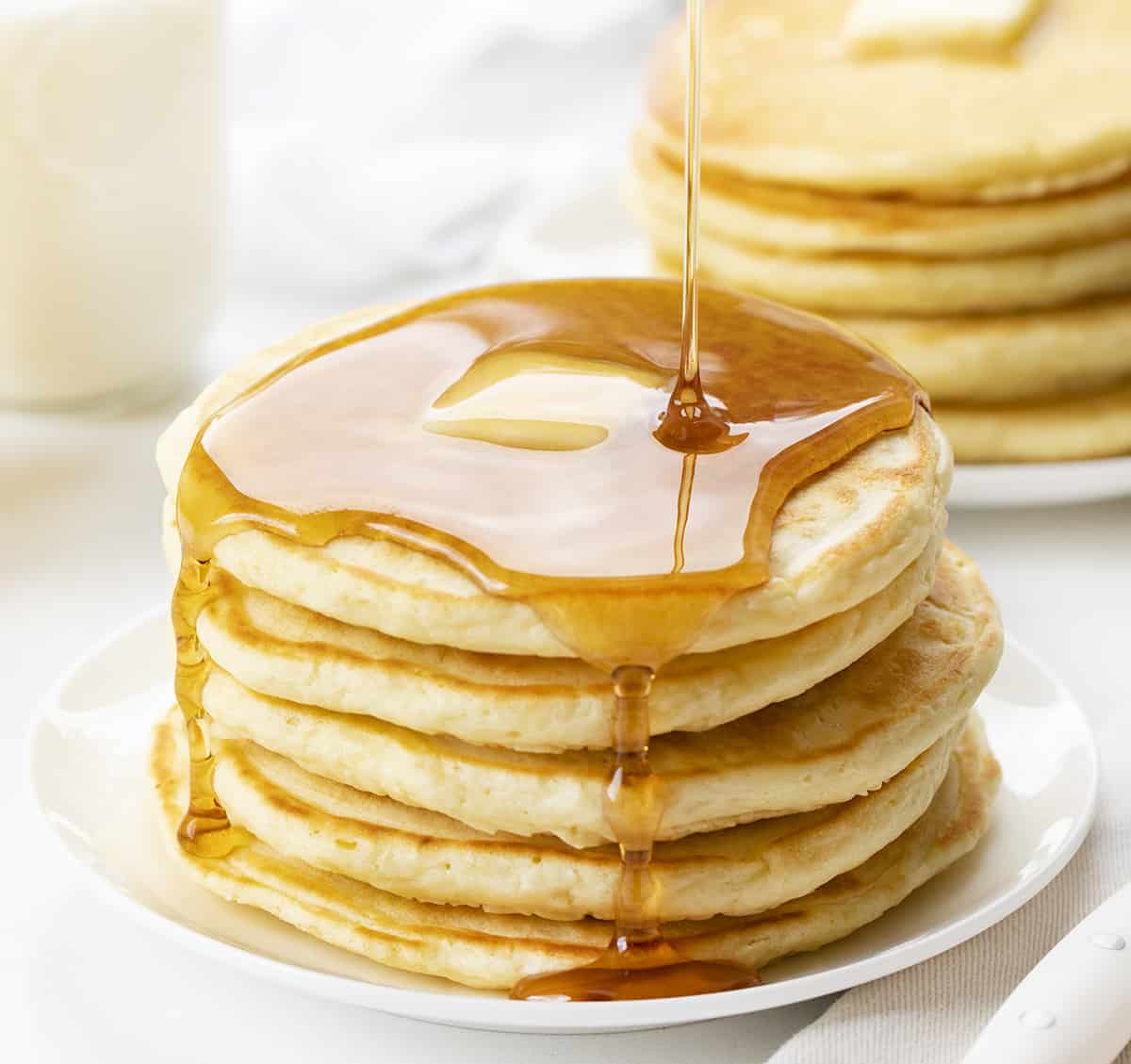 Pouring Syrup Over Stack of Old Fashioned Pancakes. Breakfast, Pancakes, Old Fahsioned Pancakes, Classic Pancake Recipe, Grandma's Pancake Recipe, i am baker, iambaker.