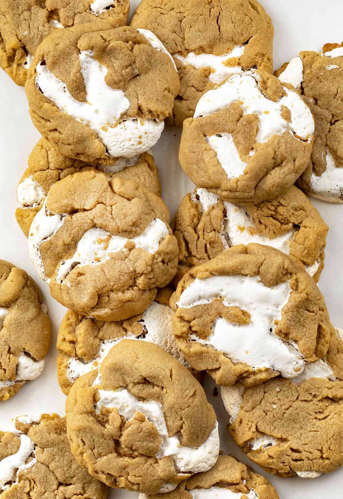 Fluffernutter Cookies on a White Counter From Overhead. Baking, Cookies, Cookie Recipes, Peanut Butter Cookies, Peanut Butter Marshmallow Cookies, Marshmallow Fluff, Cookie Exchange, Dessert, Easy Cookies, i am baker, iambaker