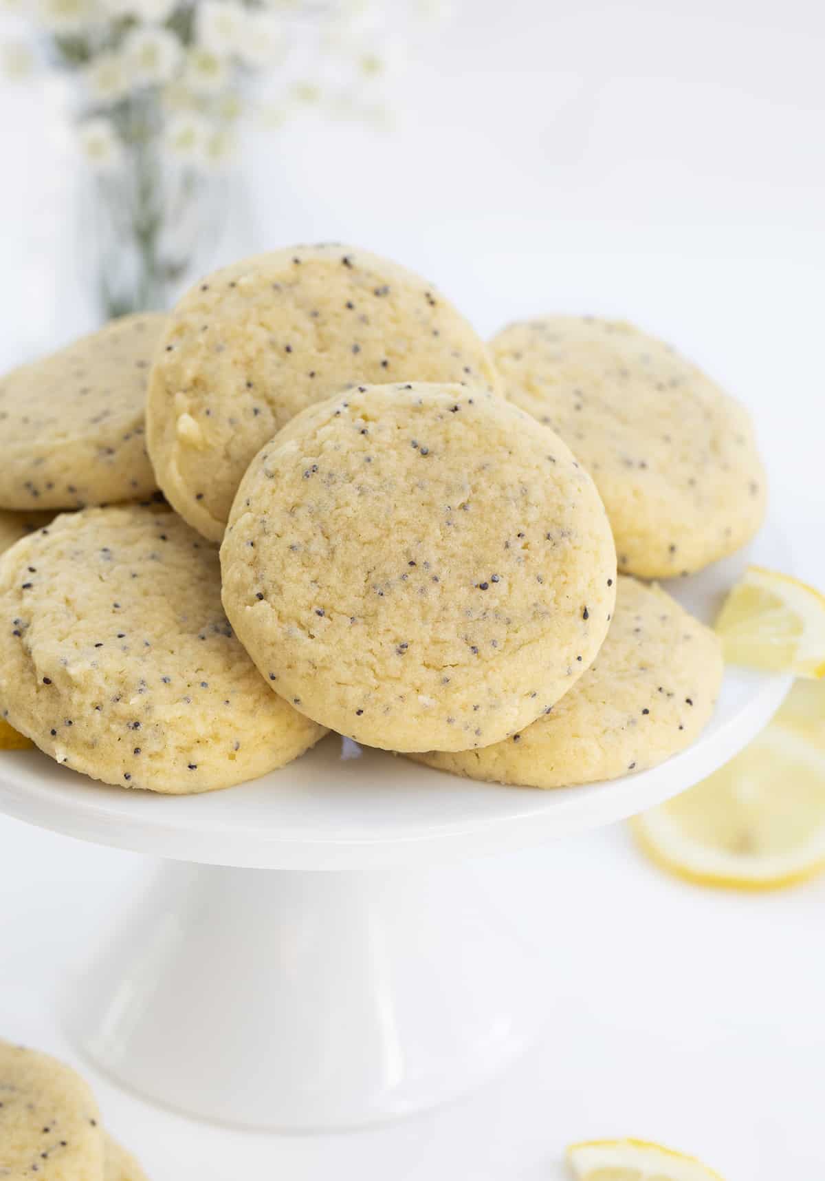 Lemon Poppy Seed Cookies on a a Stand with Flowers. Cookies, Baking, Cookie Recipes, Lemon Cookies, Lemon Poppyseed Recipes, Christmas Cookies, Dessert, Lemon Desserts, i am baker, iambaker