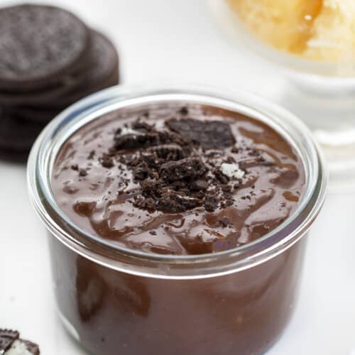 Glass Jar Filled with Oreo Chocolate Shell and Oreo Sprinkled on Top. ICe Cream Toppings, Dessert, Magic Shell, How to Make Magic Shell, Easy Chocolate Shell Recipes, No Bake Dessert, dessert recipes, Ice Cream Topping Ideas, i am baker, iambaker