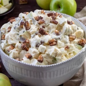 Bowl of Snickers Candy Salad with Apples Around It. Dessert, Summer Salads, Midwestern Salad, Candy Apple Salad, Fluff Salads, Whipped Cream Salads, BBQ Salad, i am baker, iambaker