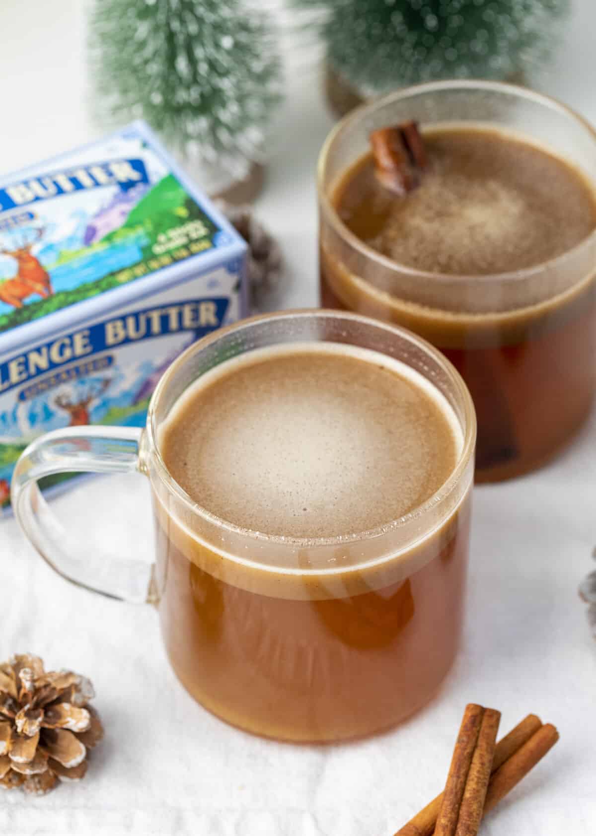 Glasses of Hot Buttered Rum with Challenge Butter.