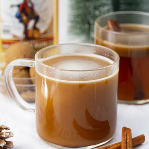 Two Hot Glasses of Hot Buttered Rum and Cinnamon.
