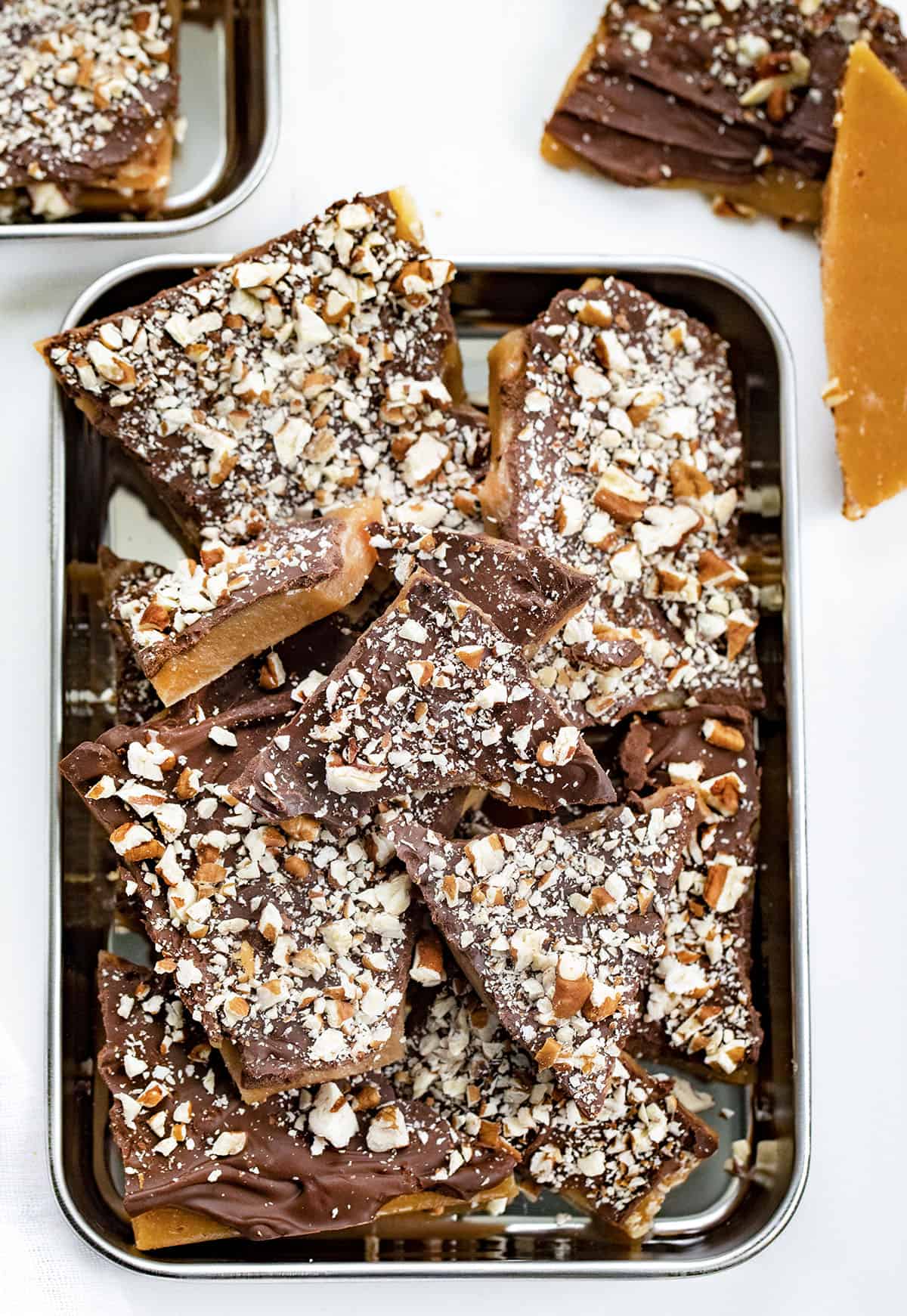 Trays of Homemade English Toffee broken into Pieces. 