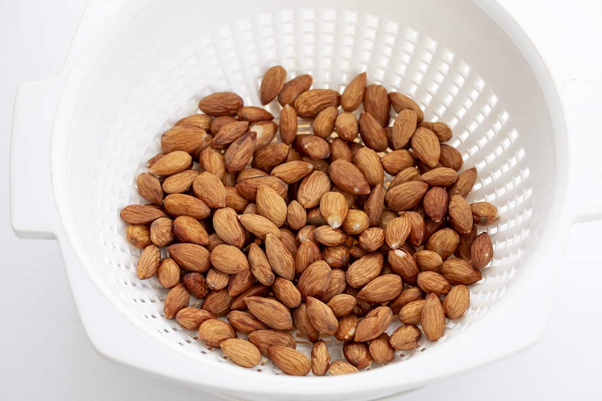 Almonds after being boiled to easily remove skins. Almond Paste, How to Make Almond Paste, Where to Buy Almond Paste, Almond Paste vs Marzipan, Almond Paste Cake, Almond Paste Ingredients, Best Almond Paste, How to Make Almond Paste from Scratch, recipes, i am baker, iambaker