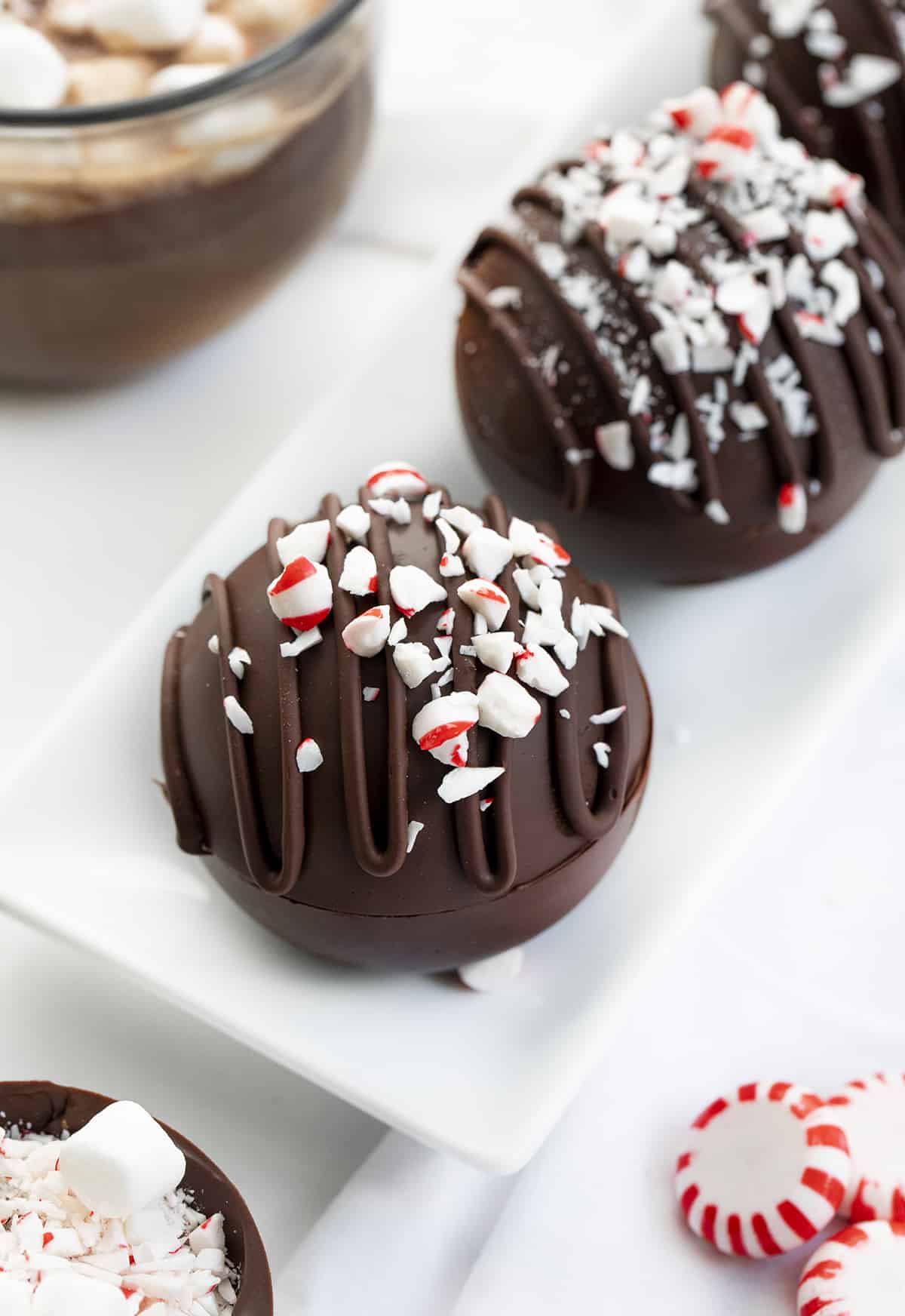 Peppermint Hot Cocoa Bombs in a White Platter.