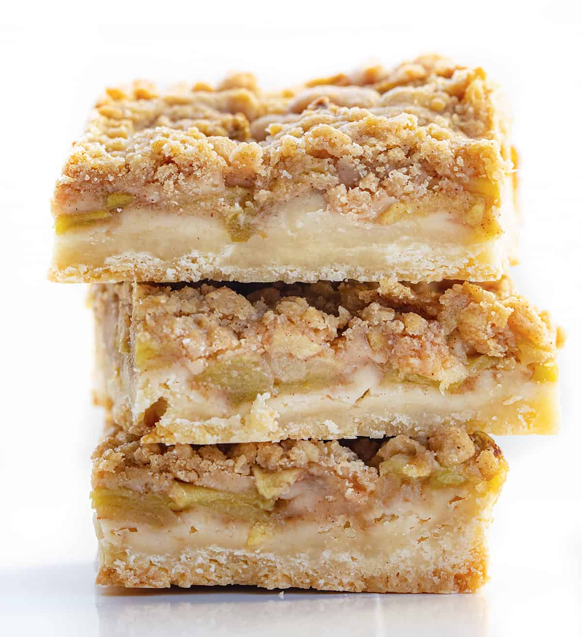 Stack of Apple Shortbread Bars on White Counter.