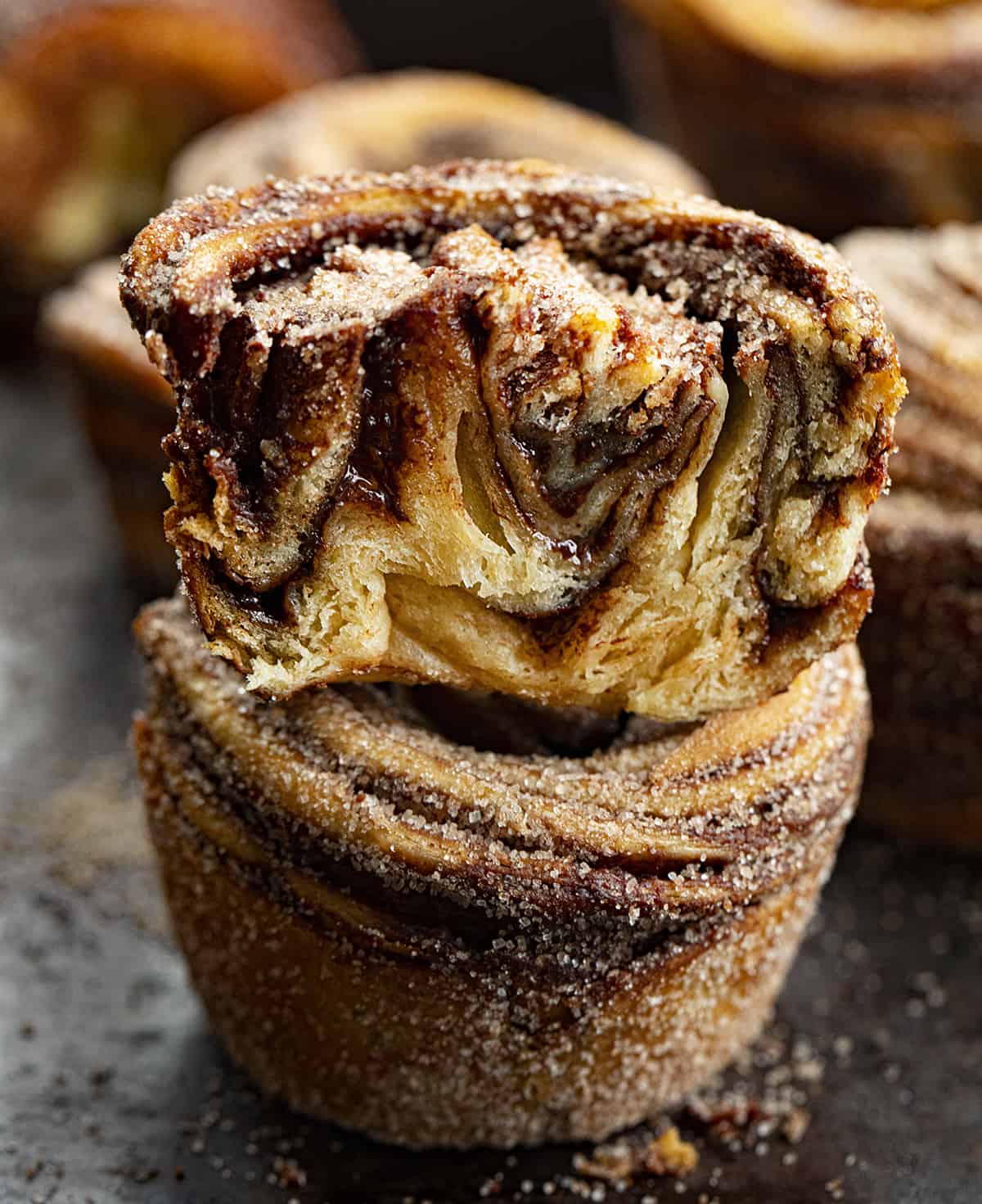 One Chocolate Peppermint Cruffin Cut in Half and Stacked on top of another cruffin.