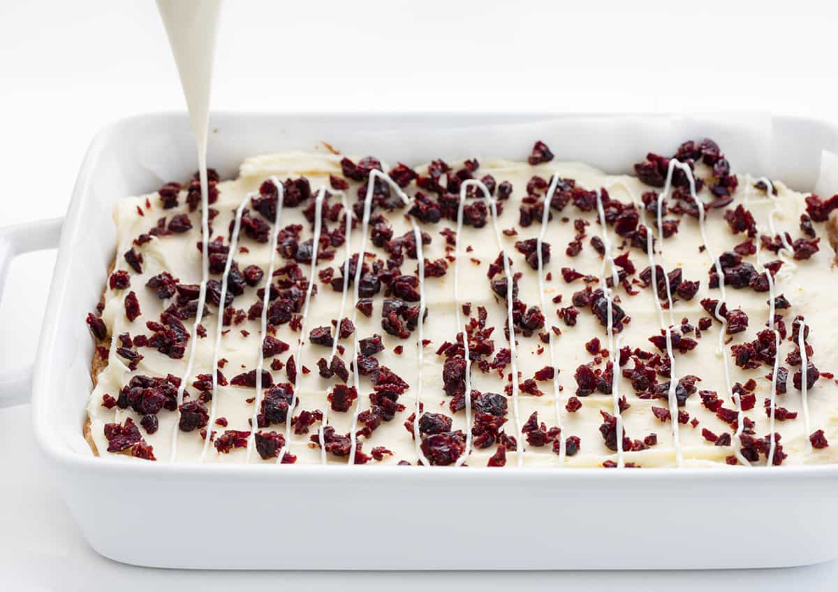 Drizzling White Chocolate over Cranberry Bliss Bars Still in the Pan.