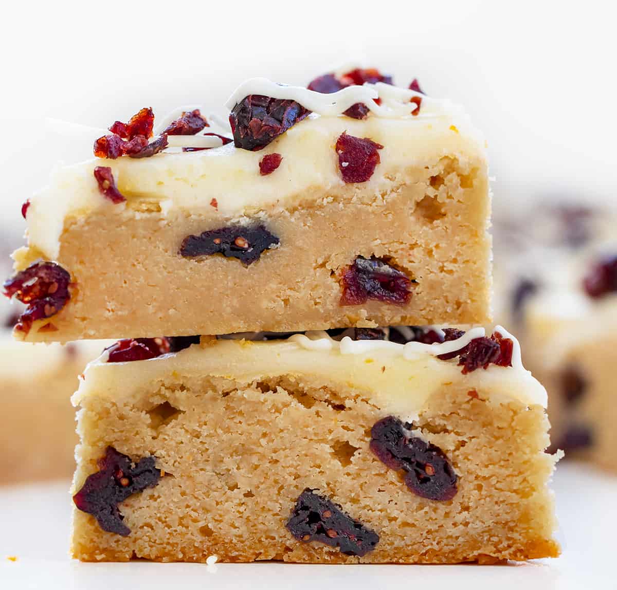 Stacked Cranberry Bliss Bars Showing Texture and Layers.
