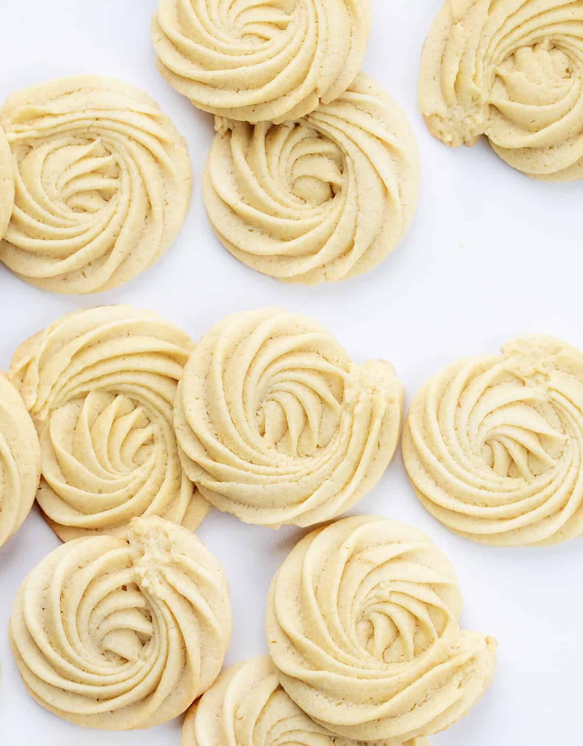 Many Butter Cookies on a White Counter.