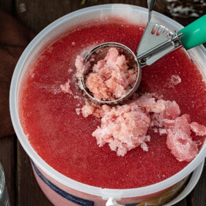 Bucket of Christmas Slush with Some Scooped Out.