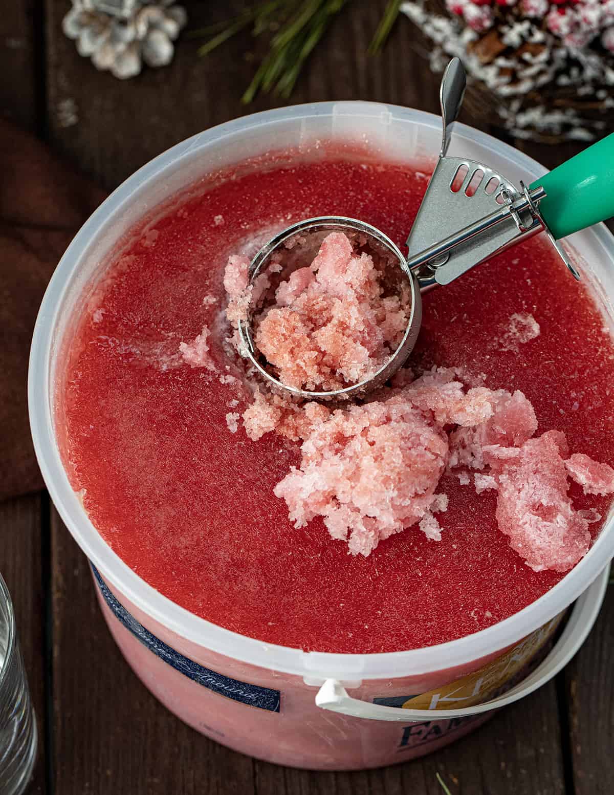 Bucket of Christmas Slush with Some Scooped Out.