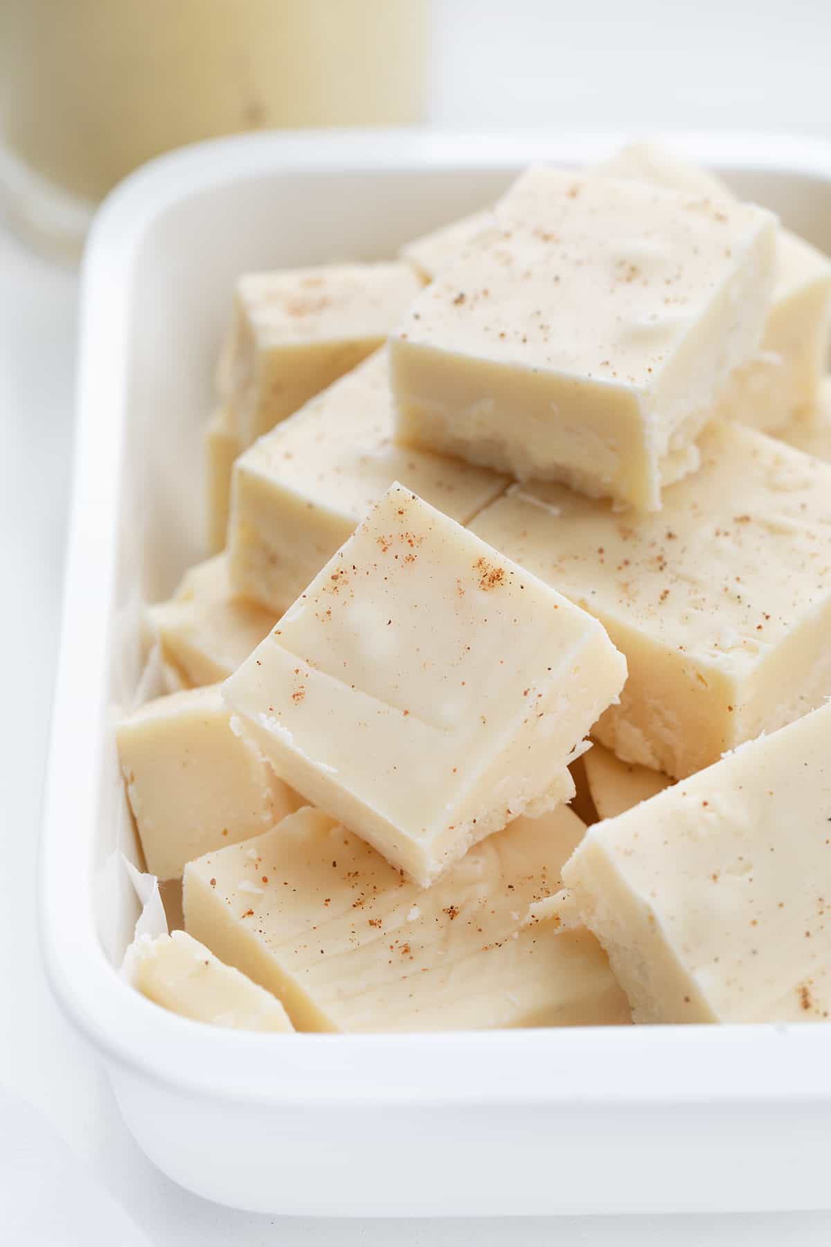 Eggnog Fudge in a Container Stacked up. 