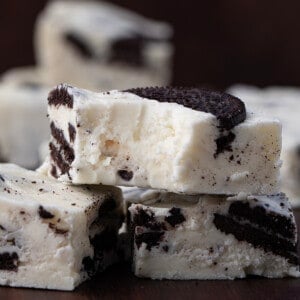 Bit into Piece of Cookies and Cream Fudge Stacked up.