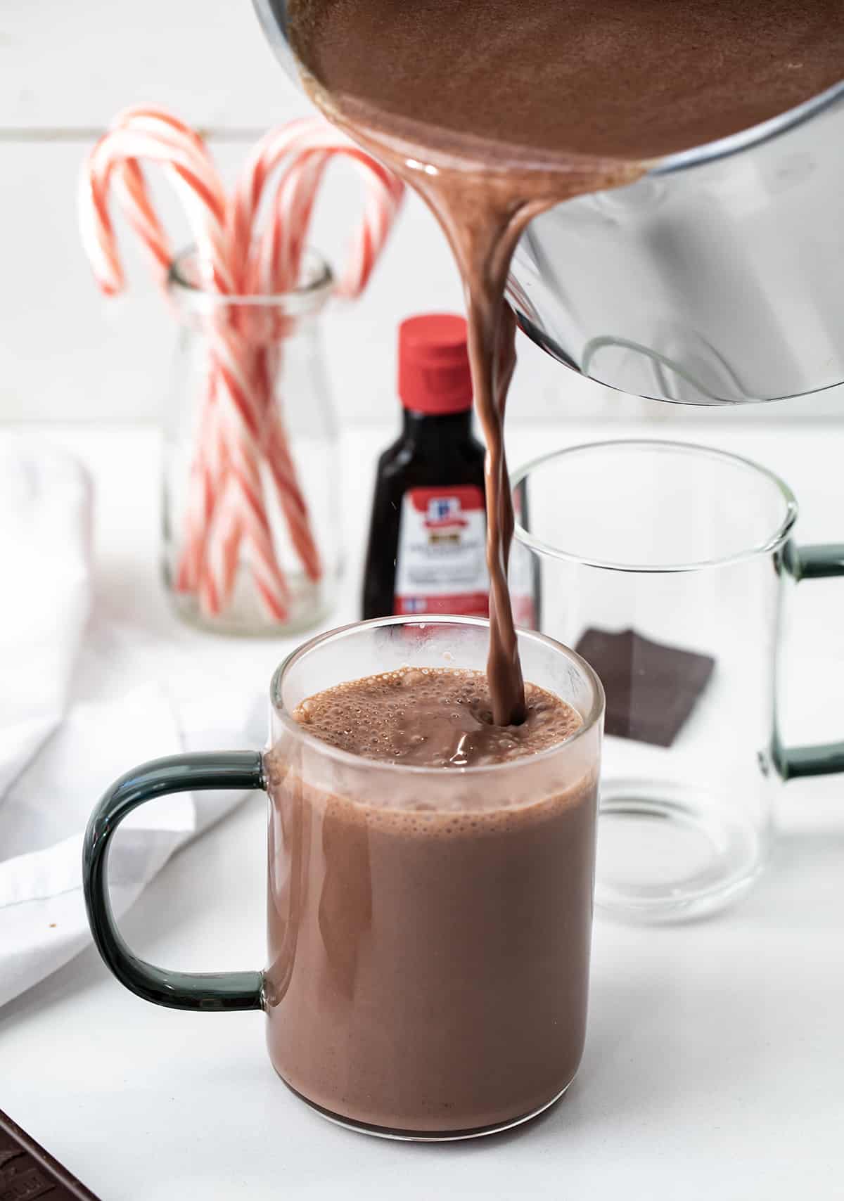 Pouring Peppermint Hot Chocolate into a Glass.
