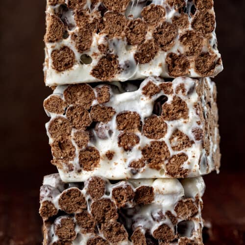 A stack of Cocoa Puff Bars That Have Been Cut Showing Inside Texture.