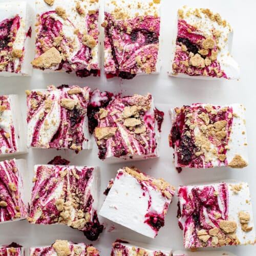Pieces of Gourmet Blueberry Marshmallows On a White Surface and Cut into Squares.