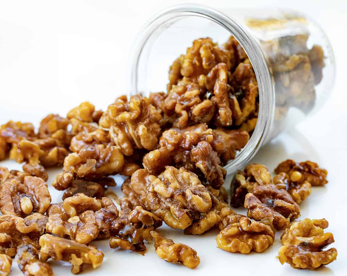 Jar of Candied Walnuts Tipped Over and Some Falling out Onto the Counter.