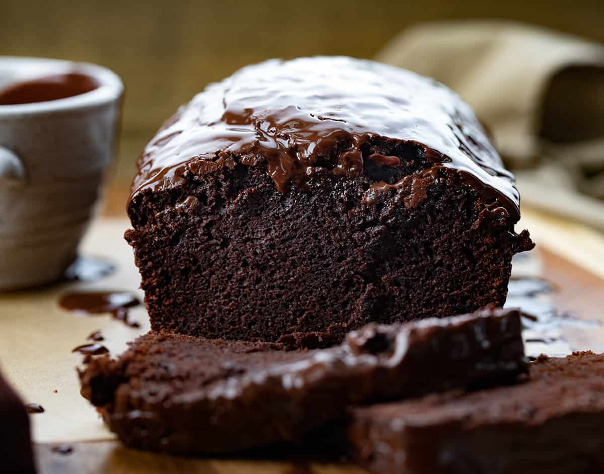 Close up of the inside of Brownie Bread Sitting on a Cutting Board.