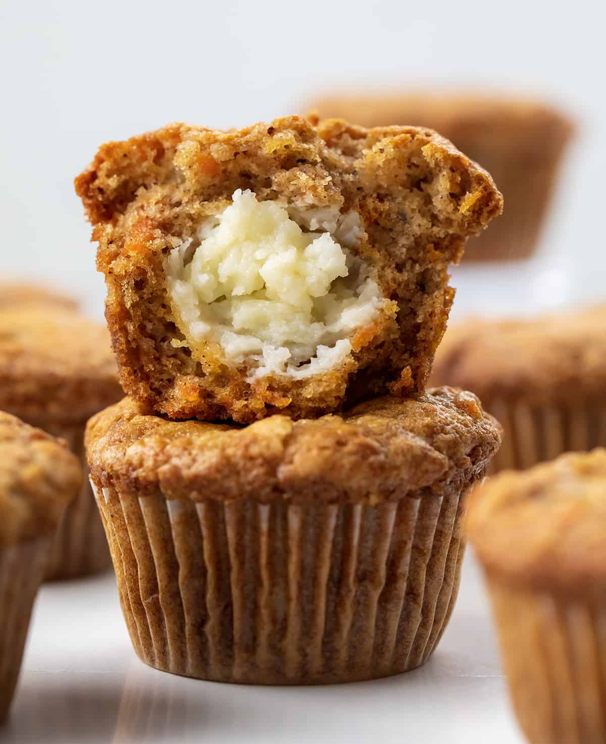 Cupcake Muffins with Cream and Decoration Carrot Cake on Table