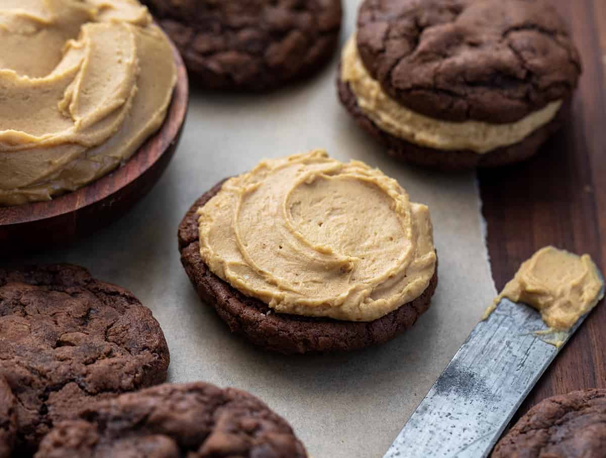 One Side of a Chocolate Peanut Butter Sandwich Cookies with the Peanut Butter Frosting Swirled on it Before Adding Other Cookie.